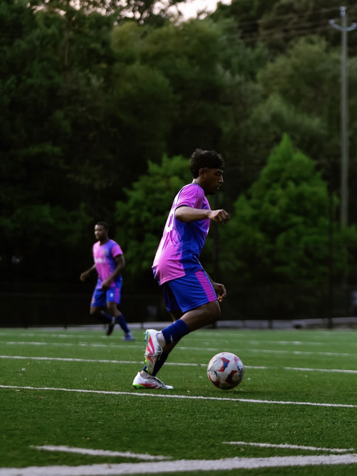FC Columbus Elite player carrying the ball forward